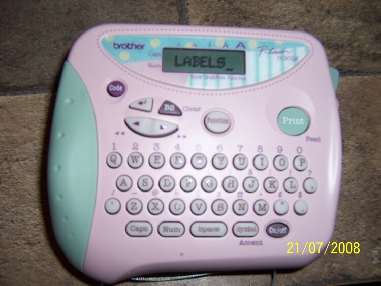 Brother PT 1100 label maker with characters