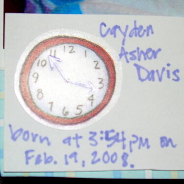 Closeup of clock on pg.5 (final page) in mini pregnancy scrapbook