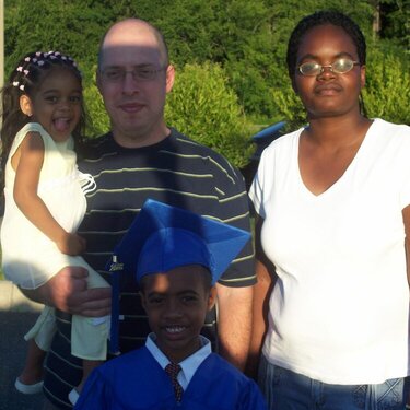 Jourdian with his family after graduation