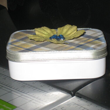 Side view of Secrets tin