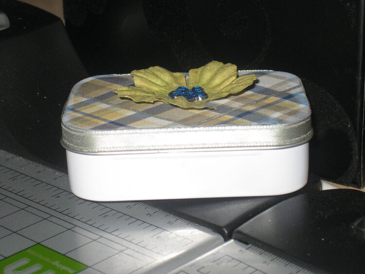 Side view of Secrets tin