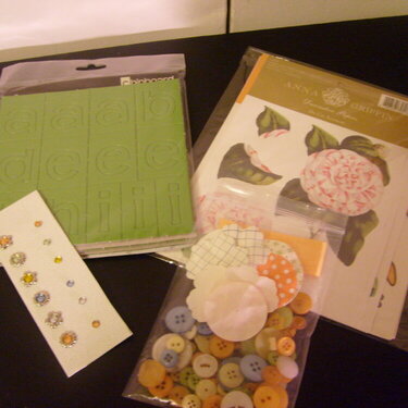 Flowers, buttons,chipboard and Gems!!