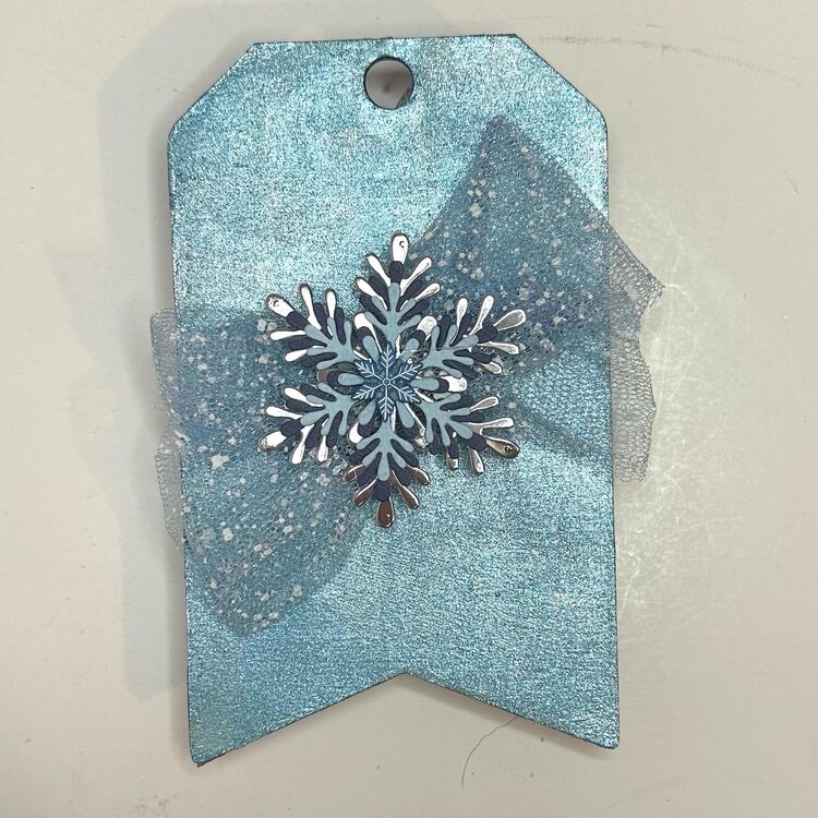 Snowflake tag flip