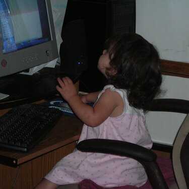 Izabella playing at the computer