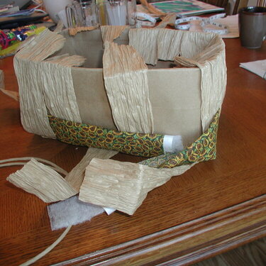 Side of basket, weave...  1st &amp; 2nd row fabric, 3rd paper twist