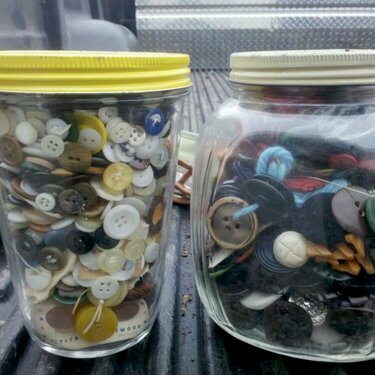 two jars of vintage buttons