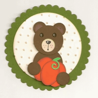 Bear holding Pumpkin.