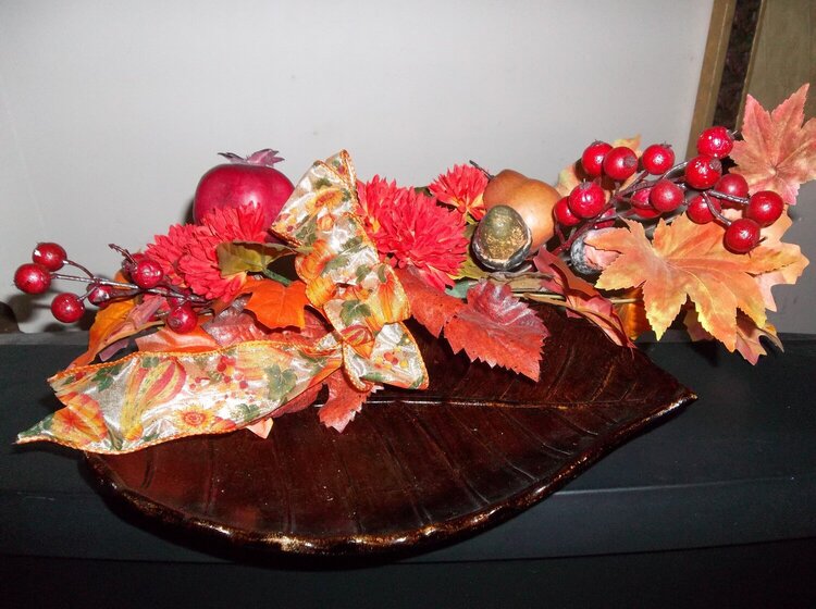 floral swag on a wooden bowl