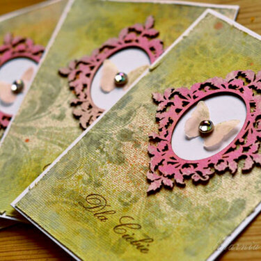 set of cards with floral frame and glass pearl