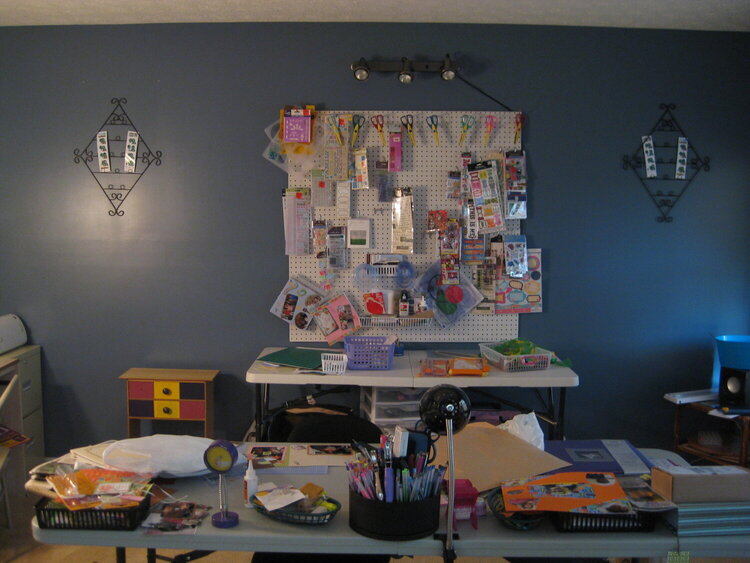 Back wall in the craft room b/4 cleanup