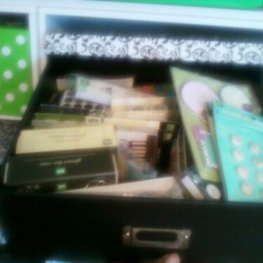 This is the big box in the middle I keep my MM embellies that I have yet to open in here...