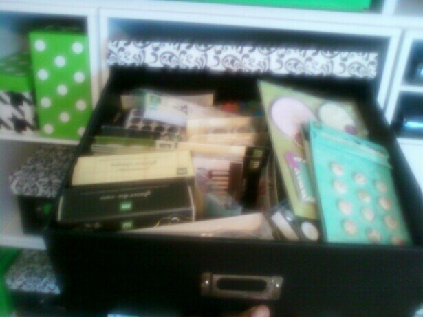 This is the big box in the middle I keep my MM embellies that I have yet to open in here...