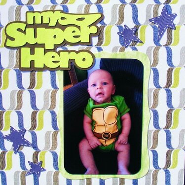 My super hero.  My DGS in his Teenage Mutant Ninja Turtle onsie.