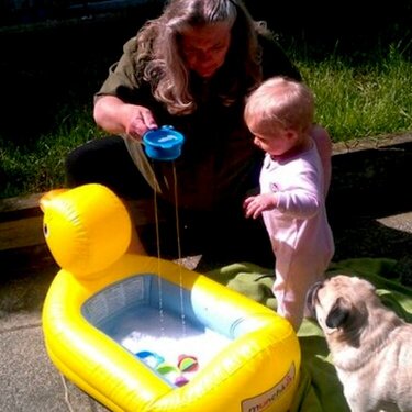 Nana and Katie getting to know duckie