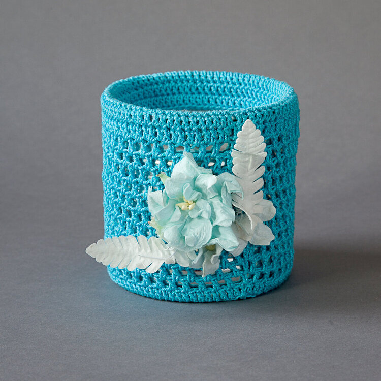 Turquoise tin with blue flower