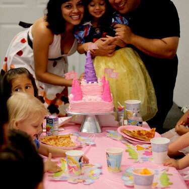 Birthday girl loves her princess castle cake. .