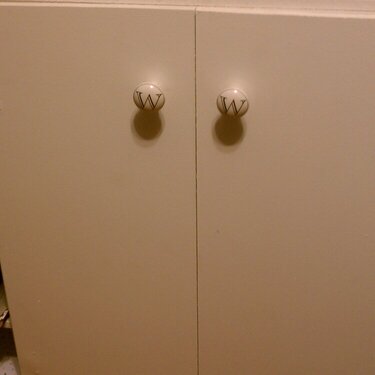 My husband finally put my door knobs on my desk cabinet!!!  WW