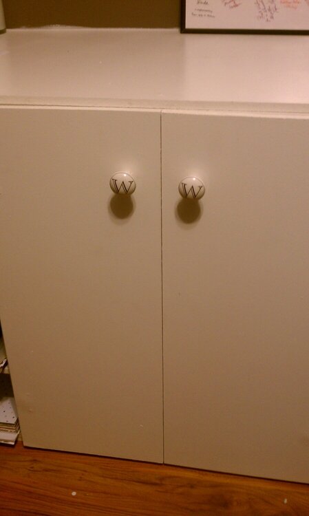 My husband finally put my door knobs on my desk cabinet!!!  WW