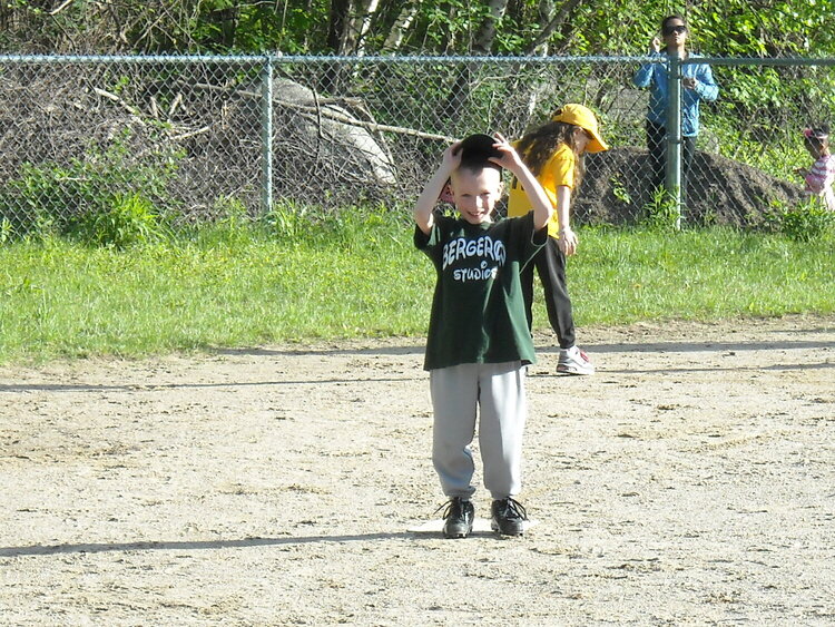 Evan heading for 2nd Base and showing off....