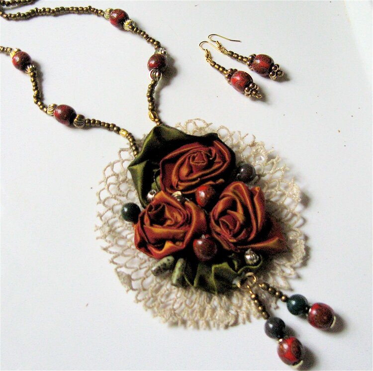 Handmade jewelery /ribbon roses