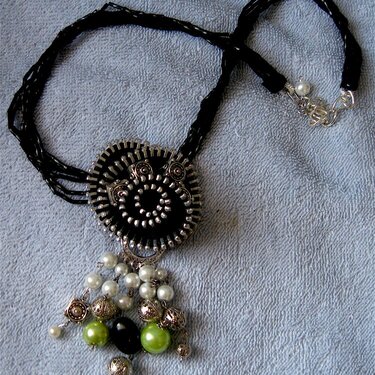 zipper rose and beaded necklace.