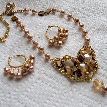 Antique pink/beige beads design.