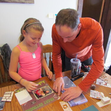 Ana with her Dad Ward scrapbooking