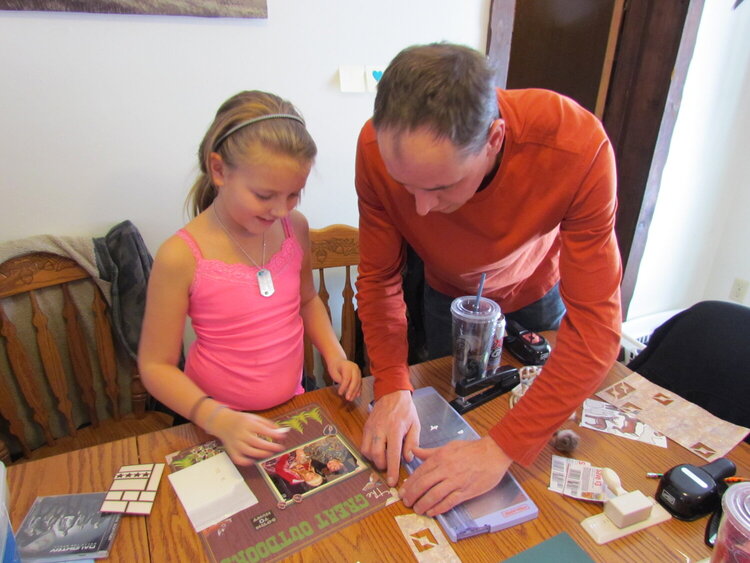 Ana with her Dad Ward scrapbooking