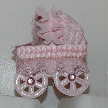 Baby carriage in pink