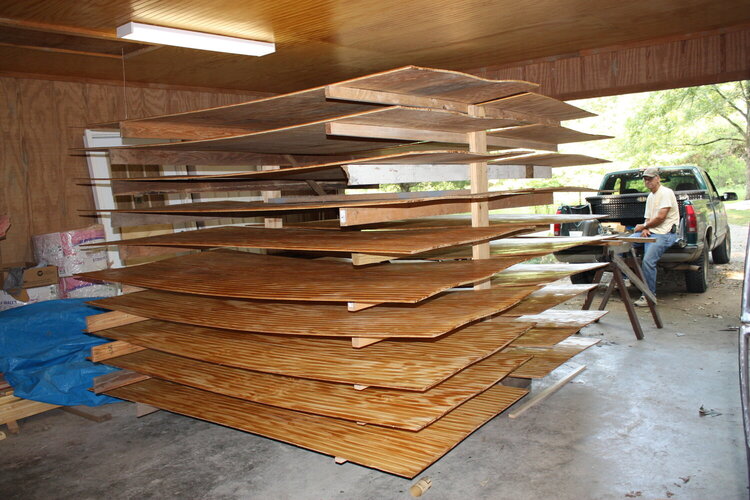 Drying rack with 20 sheets of freshly varnished beadboard
