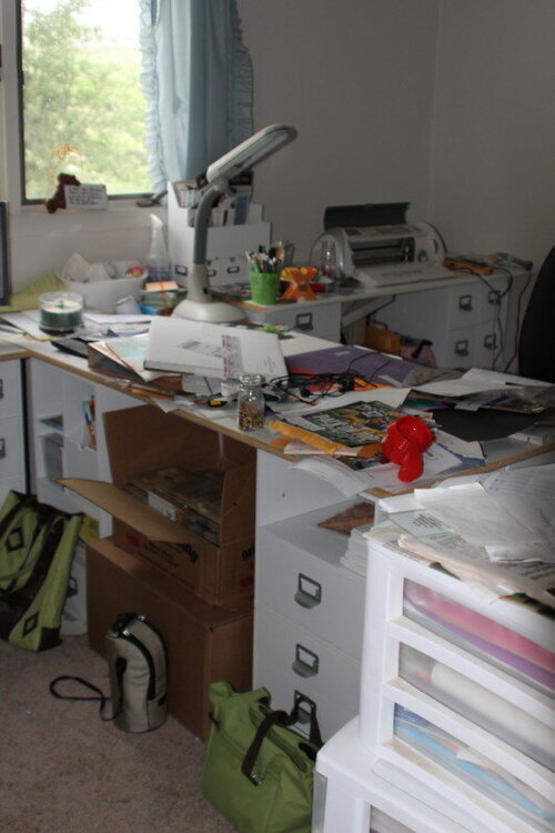 messy, messy scrap desk
