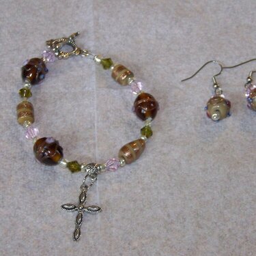 brown , green and pink bracelet and earrings