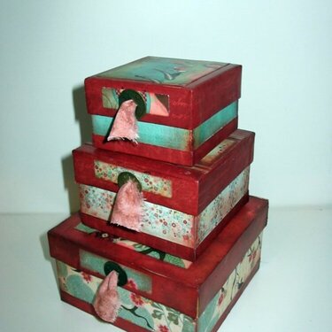 Altered candy tower boxes stacked