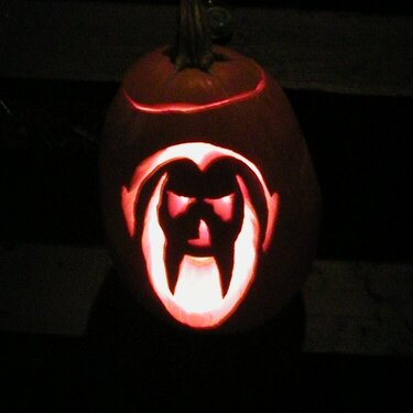 Vampire pumpkin with candle