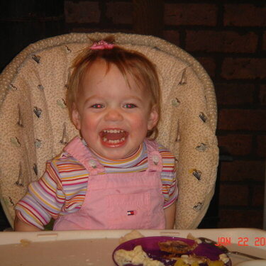 Kayley in the high chair