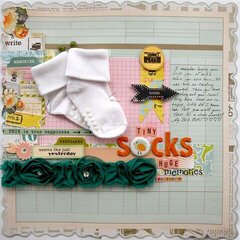 Perserving baby socks on a layout