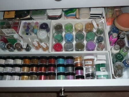 Drawer with embossing powers, glitter and overstock ink pads