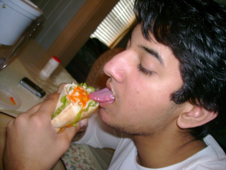 suraj eating falafel