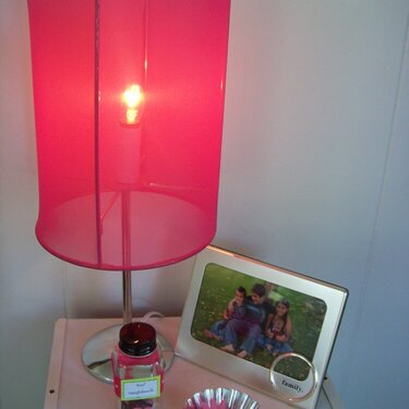 pink lamp, spice bottle, and cupcake holder