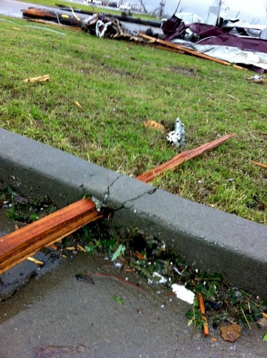Joplin tornado shot a 2X4 thru a curb