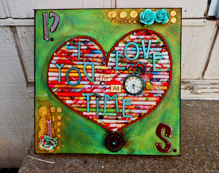 Straw heart canvas. I made these straws out of a magazine about &quot;creative spaces&quot;. The magazine was so colorful the straws are b