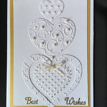 Embossed hearts wedding card