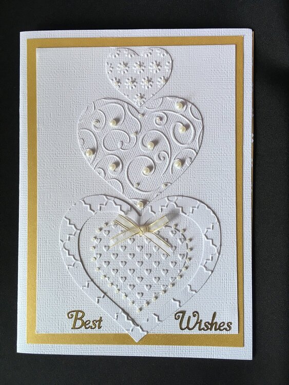 Embossed hearts wedding card