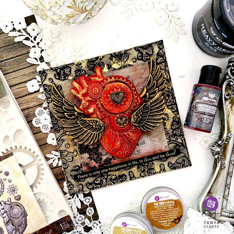 Textured mixed media heart canvas by Tanya Cloete