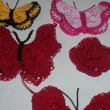 crocheted rose and butterflies