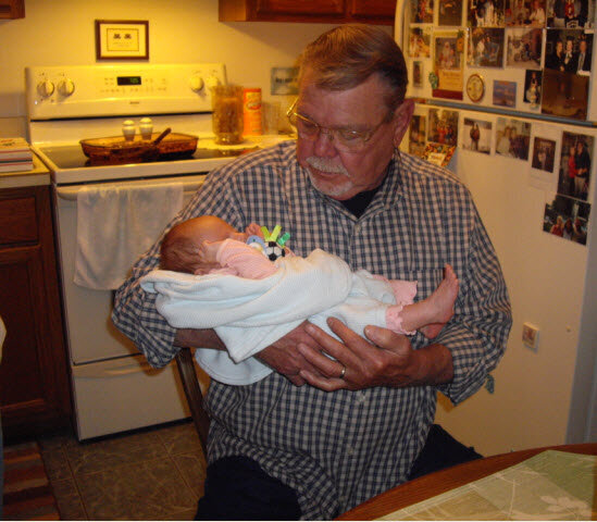 Pipi holding newborn 2009