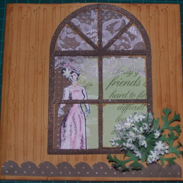the outside of a window card with a selfmade flower