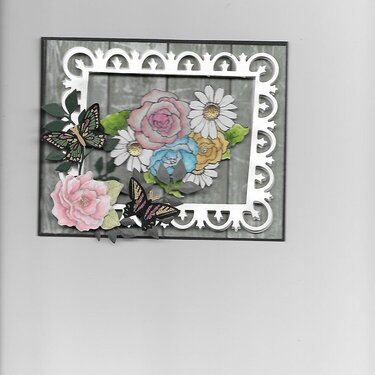 Framed Roses.  I saw a card on Scrapbook.com by Caletts and I though I would try doing a similar one myself.  Her card was so pr