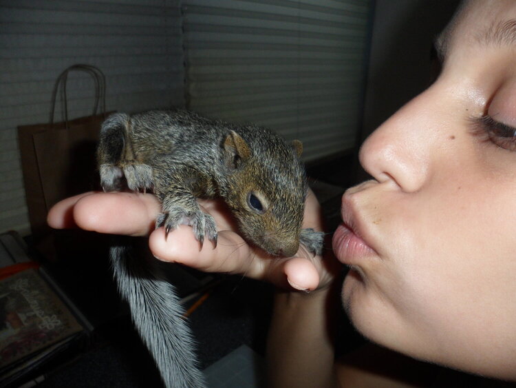 she kissed a squirrel!