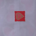 Gold stickers on red cardstock